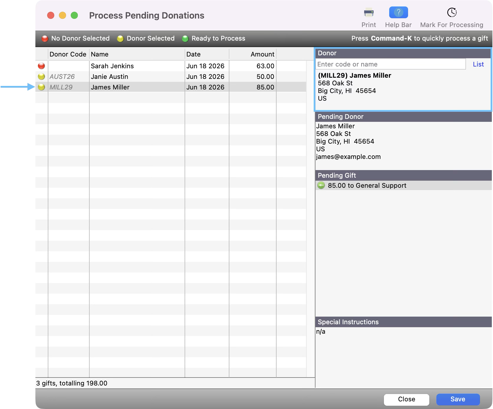 Process Pending donation window with the donor record highlighted and an arrow pointing to the yellow dot.